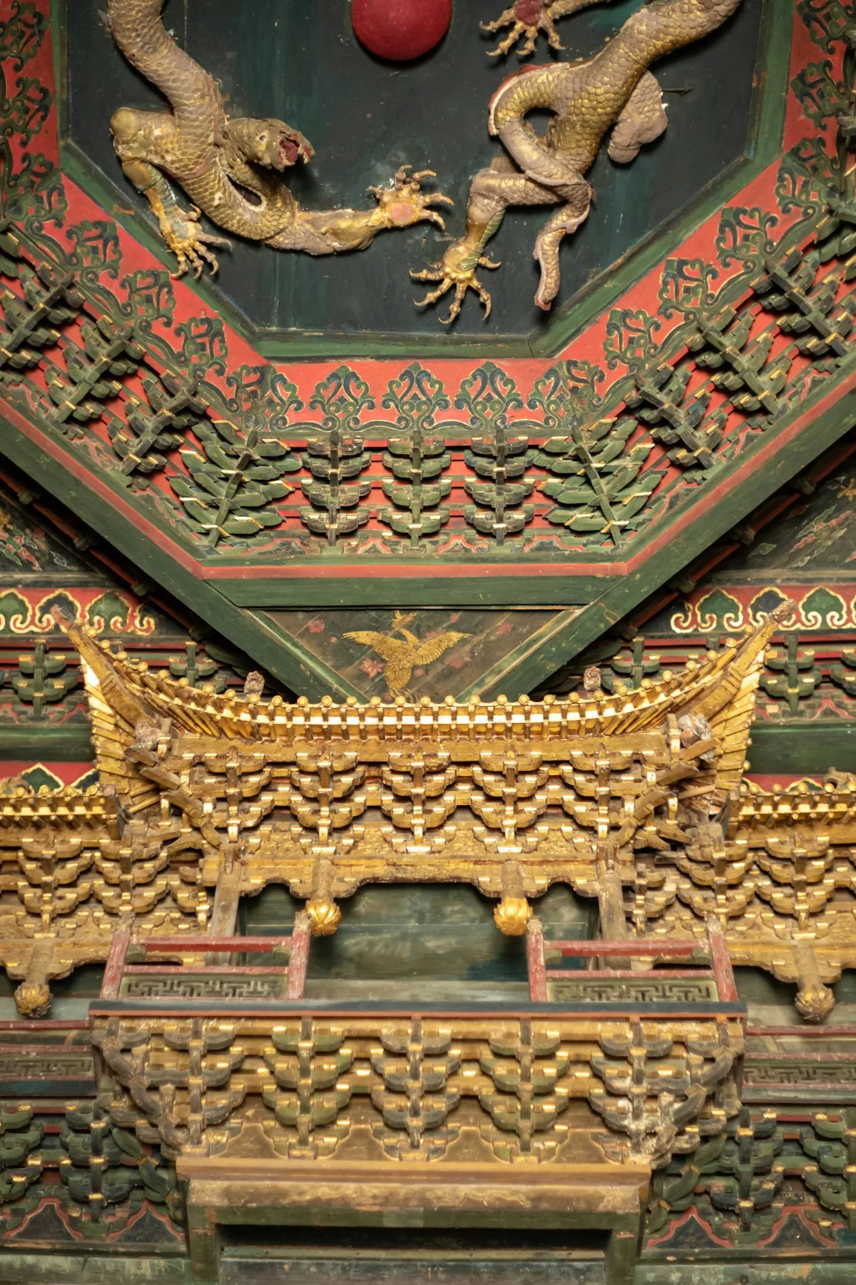 Golden dragon carvings on traditional Chinese architecture