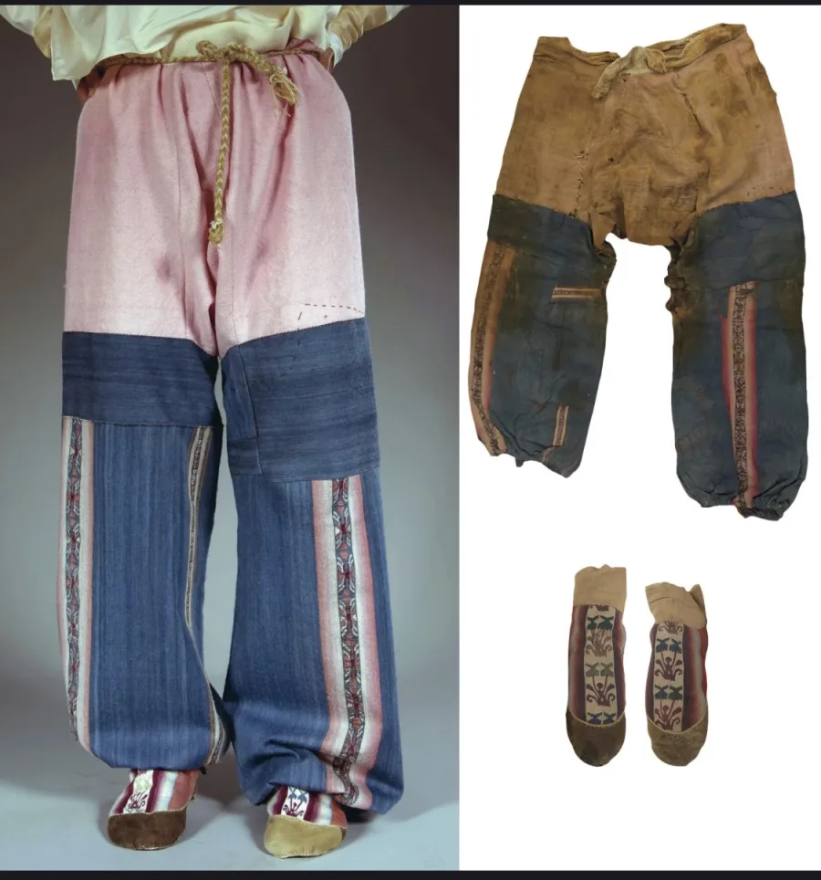 Han-dynasty woollen trousers and embroidered socks from the Niya site, showing pink and indigo two-tone construction with decorative woven bands