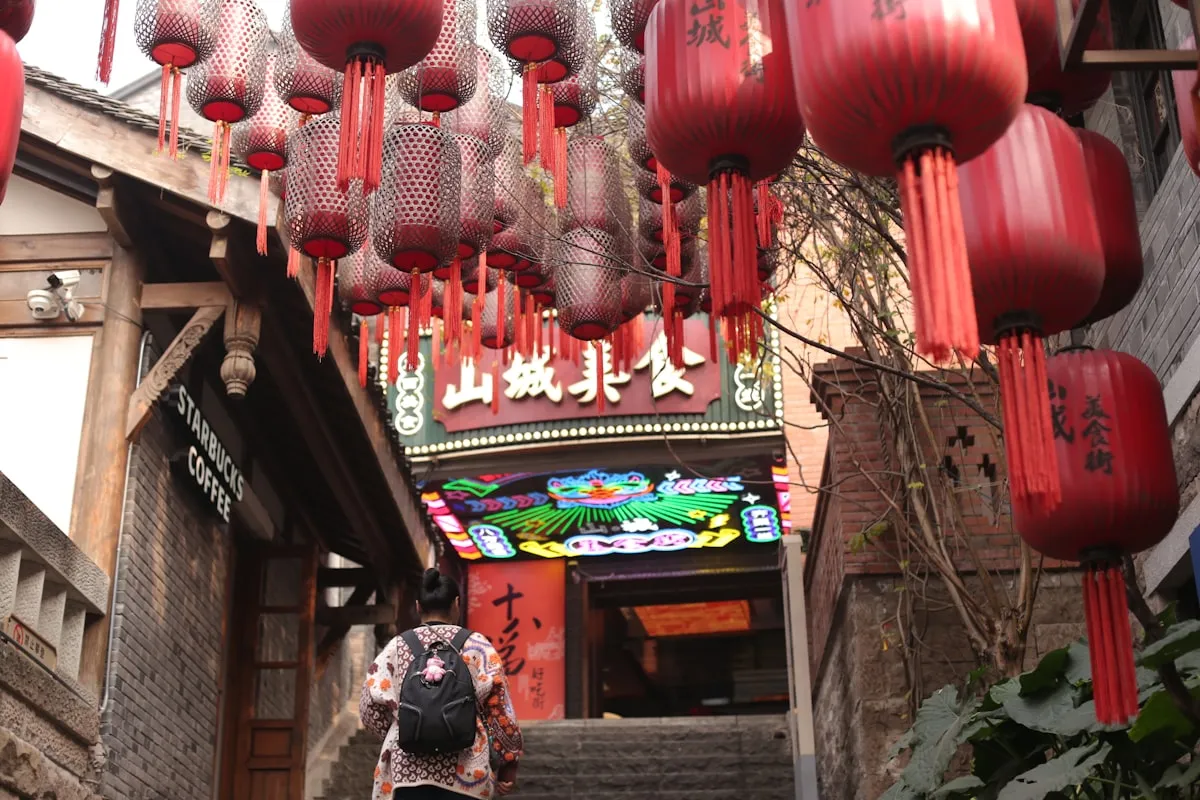 Red lanterns hanging over a traditional Chinese street during Spring Festival celebrations